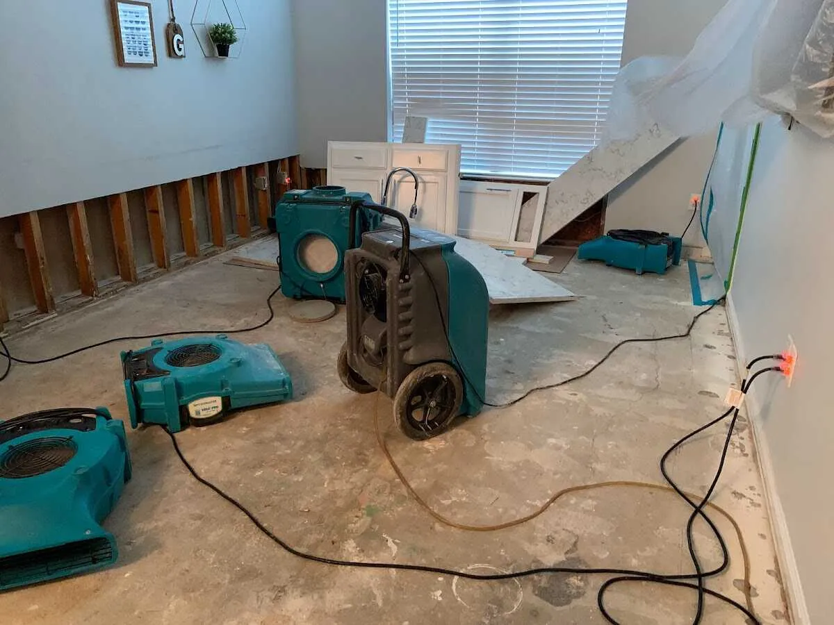 Dehumidifier in flood-cut room for Water Extraction & Removal in Asbury
